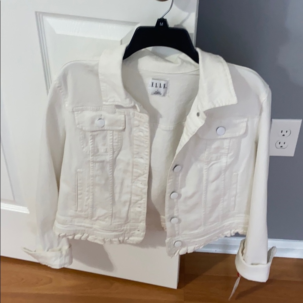 Woman’s white jean jacket